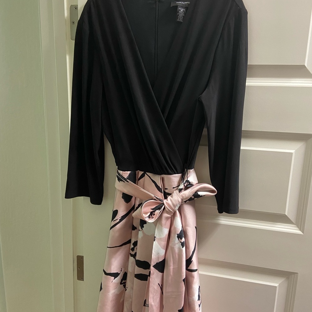 Beautiful pink mid-length formal dress with large sash